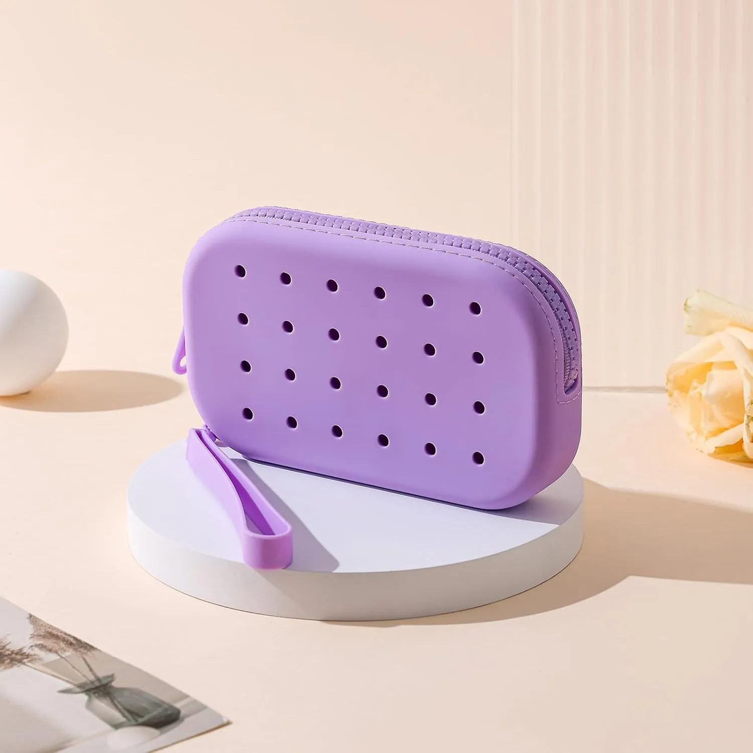 JOVAKIT Small Portable Silicone Makeup Bag for Women with Decorative Holes, Travel Waterproof Toiletry Cosmetic Bag Gifts for Women, Zipper Closure Makeup Case with Handle (Purple)